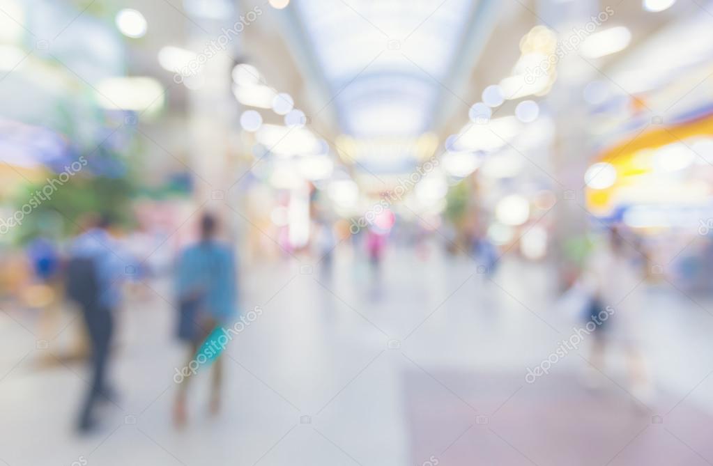 Blurred shopping mall with people walking