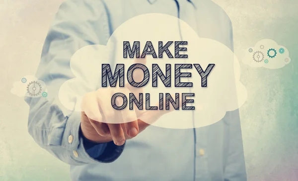 Young man pointing at Make Money Online — Stock Photo, Image