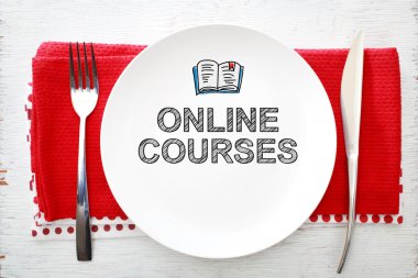 Online Courses concept on white plate clipart