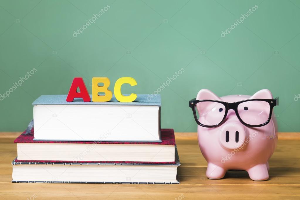 School theme with ABCs and pink piggy bank with chalkboard