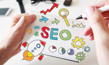 El çizim Seo kavramı defter üzerinde mans