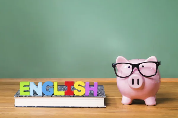 English language theme with piggy bank with chalkboard — Stock Photo, Image