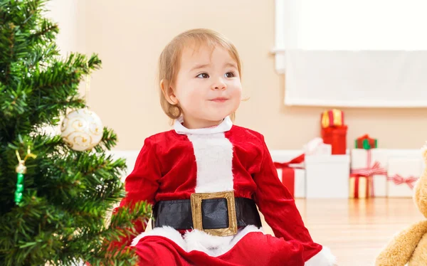 Little girl smiling on Christmas morning — Stock Photo, Image