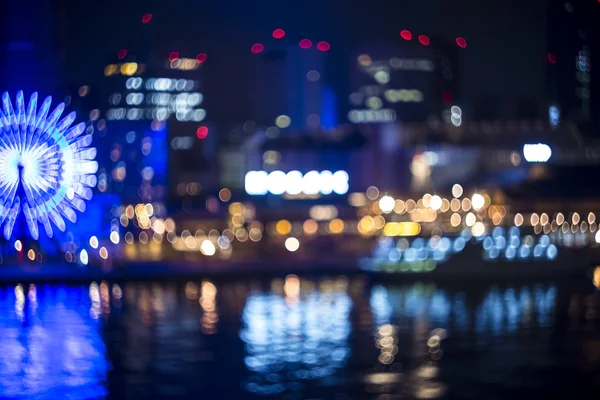 Suddig bokeh natt harbor ljus bakgrund — Stockfoto