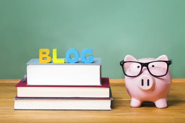 Blog theme with pink piggy bank with chalkboard — Stock Photo, Image