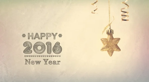 Happy New Year 2016 message with a hanging star — Stock Photo, Image