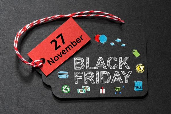 Black Friday 27 noiembrie text pe o etichetă neagră — Fotografie, imagine de stoc