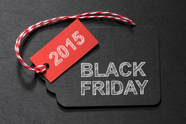Black Friday 2015 text pe o etichetă neagră — Fotografie, imagine de stoc