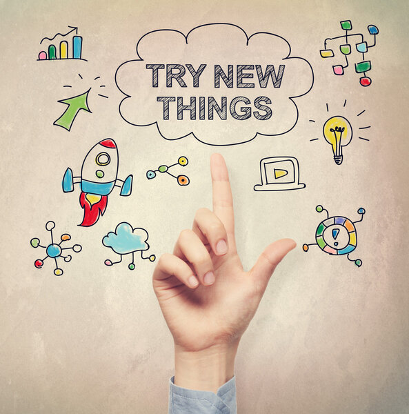 Hand pointing to Try New Things concept