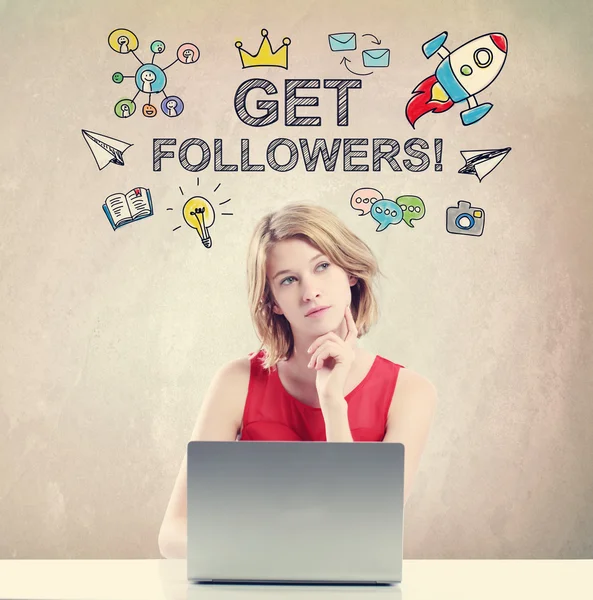 Get Followers concept with woman working on laptop — Stock Photo, Image