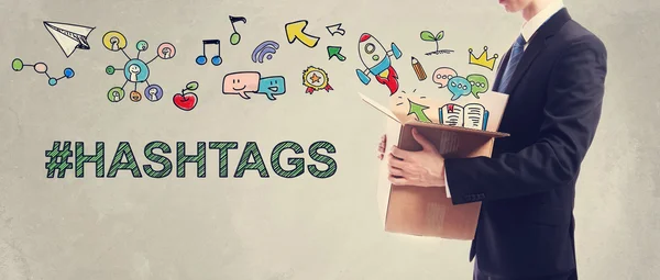 Conceito de hashtags com empresário segurando uma caixa — Fotografia de Stock