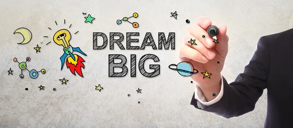 Businessman drawing Dream Big concept