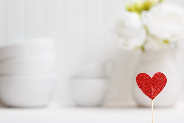 Small heart with white porcelain dishes