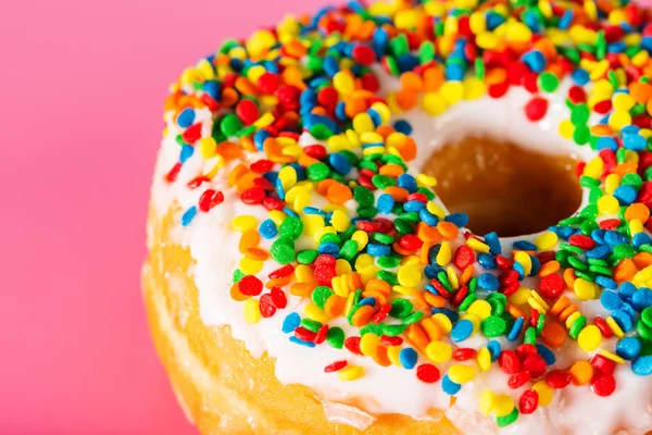 Close-up section of a sprinkled donut — Stock Photo, Image