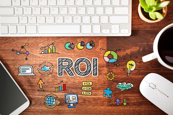 ROI concept met werkstation — Stockfoto