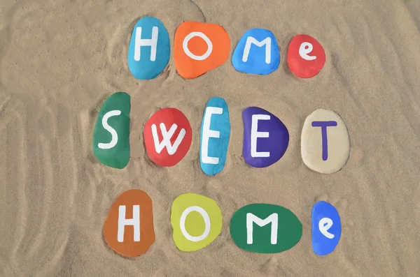 Home sweet home on colored stone letters