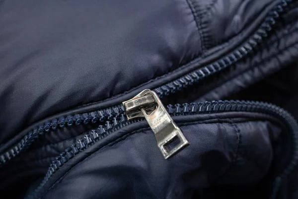 broken zipper lock. damaged zip closeup. fix cloth