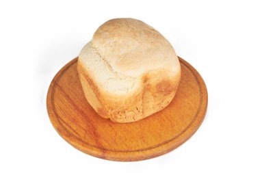 Beyaz üzerine izole edilmiş ev yapımı buğday ekmeği. yemek pişirme konsepti