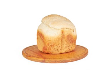 Beyaz üzerine izole edilmiş ev yapımı buğday ekmeği. yemek pişirme konsepti