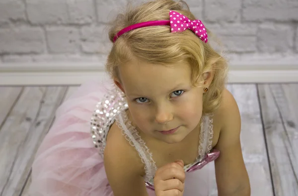 Child in a pink dress — Stock Photo, Image