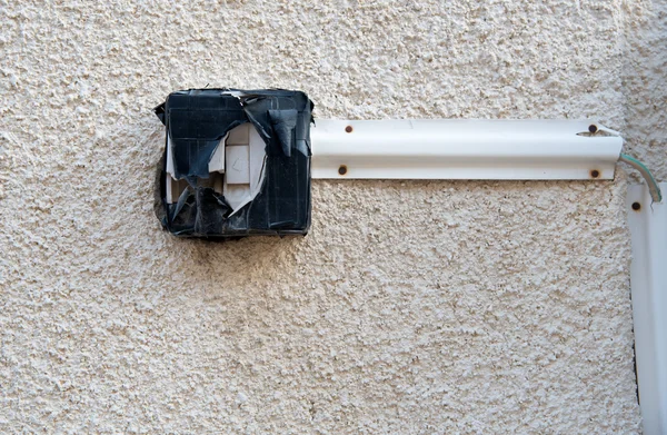Dangerous door bell switch on the wall — Stock Photo, Image