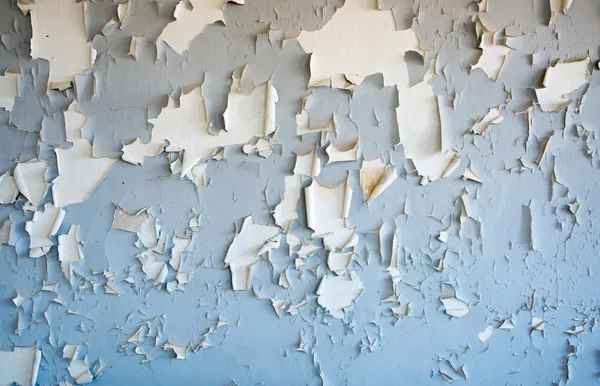 Flaking blue cracked paint on a wall — Stock Photo, Image