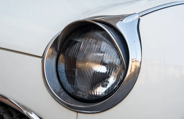 Headlight  vintage white car — Stock Photo, Image