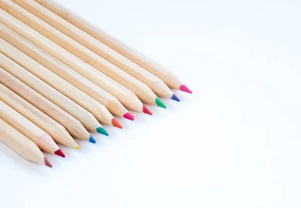 Art wooden pencils on a white background — Stock Photo, Image