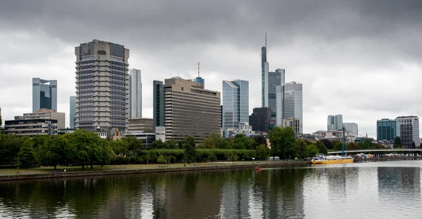 Skyline of Frankfurt city the business center of Germany with skyscrapers and the river Rhine — стокове фото