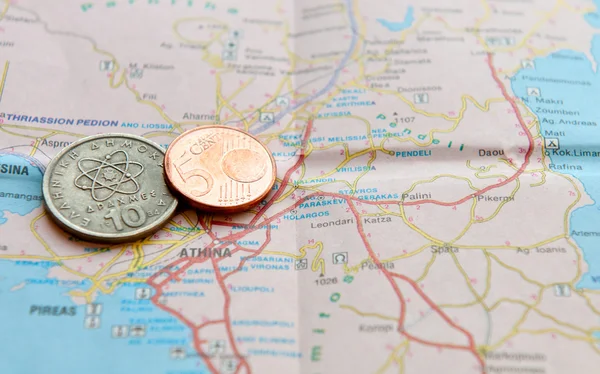 Greek drachma and Euro Cent on a Greek Map