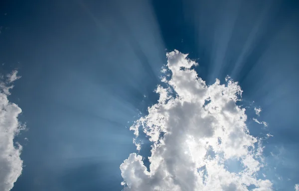 Blue sky with white clouds and  sun rays — Stock Photo, Image