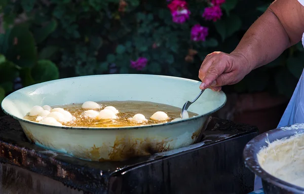 Woman cooking delicious  loukoumades pastry — Stock Photo, Image