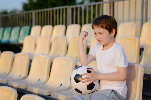 Disappointed little football fan — Stock Photo, Image