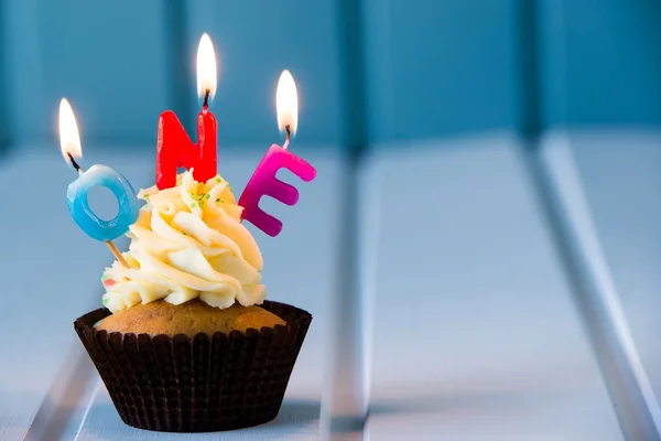 cupcake with a candles for 1 - first birthday