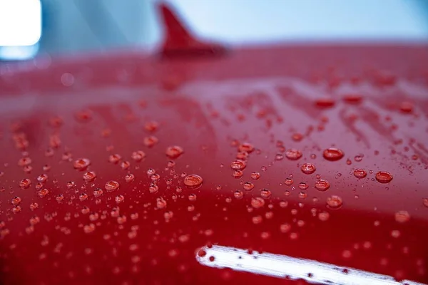 Water drops on car body. Hydrophobic effect