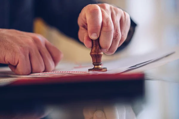 Notary public stamping the agreement or other document. — Stock Photo, Image