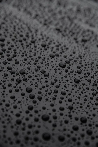 Hydrophobic effect on car varnish after using ceramic coating. — Stock Photo, Image