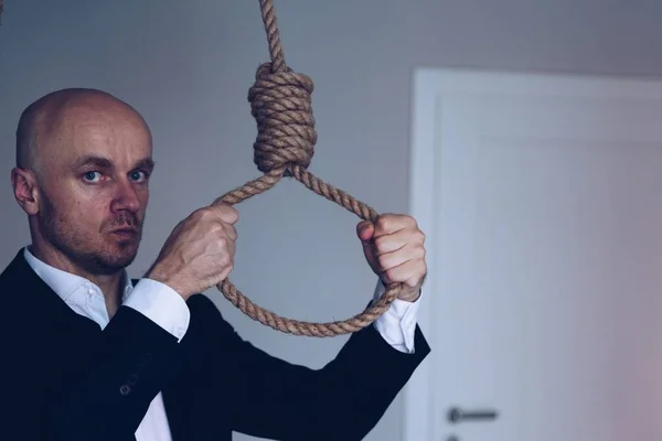 Businessman commits suicide by hanging. Suicide. — Stock Photo, Image