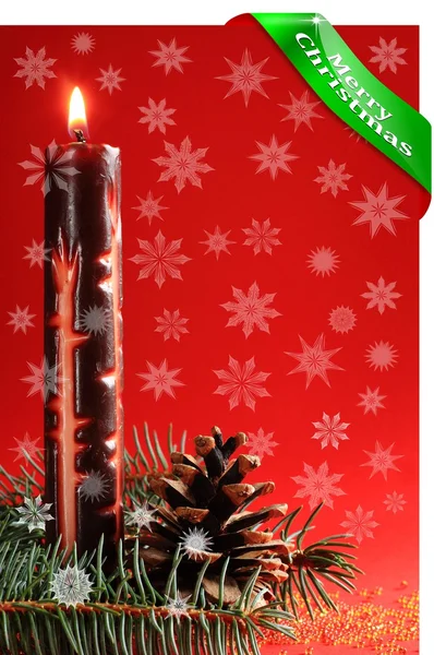 Christmas candle with a red background and a snowflake — Stock Photo, Image