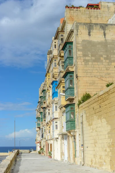 House with balconys on Malta at seaside — Stock Photo, Image