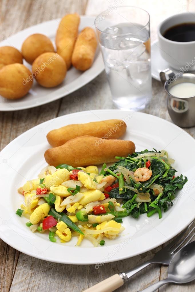 jamaican breakfast,ackee and saltfish with fried dumplings and callaloo