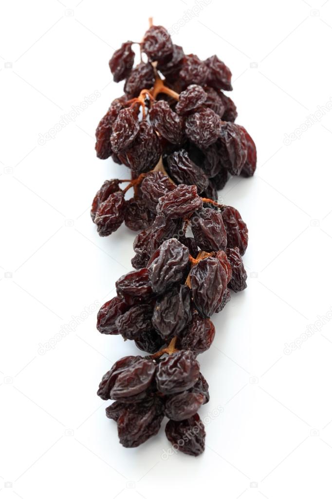 Raisins on the vine isolated on white background