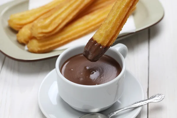 Churros y chocolate caliente, desayuno español — Foto de Stock