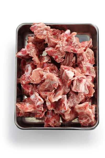 Spina di maiale sul vassoio del macellaio — Foto Stock