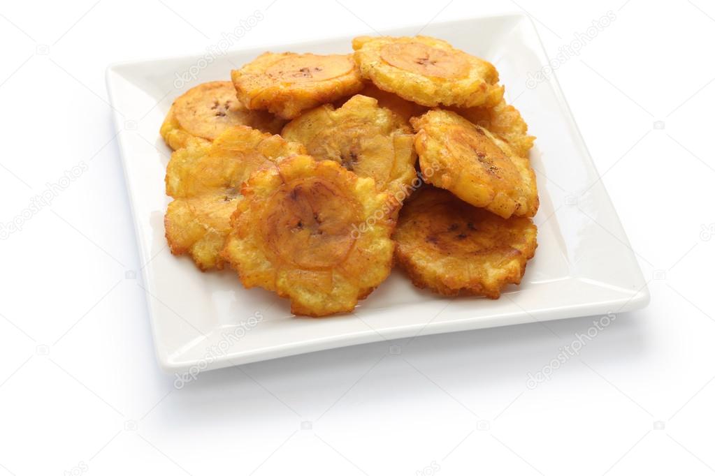 Fried green plantain banana chips Stock Photo by ©asimojet 70205297
