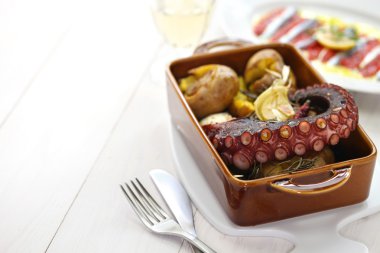 Grilled octopus with potatoes, polvo lagareiro, Portuguese cuisine clipart