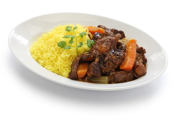 Cuban oxtail stew with yellow rice — Stock Photo, Image