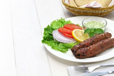 mutton seekh kabab with mint chutney clipart