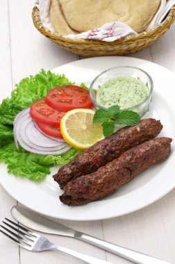 mutton seekh kabab with mint chutney clipart