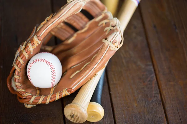 baseball glove, ball and bat